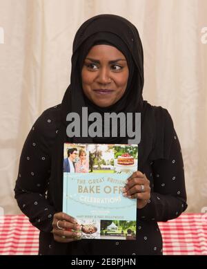 Nadiya Hussain, winner of the BBC series The Great British Bake Off, poses for photos at the Picaddilly branch of Waterstones before a book-signing in Stock Photo