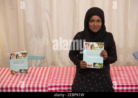 Nadiya Hussain, winner of the BBC series The Great British Bake Off, poses for photos at the Picaddilly branch of Waterstones before a book-signing in Stock Photo
