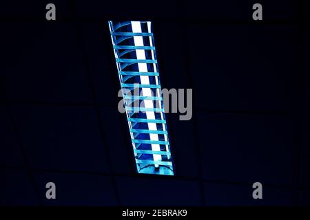 White light from Fluorescent light tube on the wall or Neon tube light.Copy space background for usage and any design. Stock Photo
