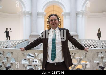 Alex Farquharson, new Director of Tate Britain poses for press photos in the Tate Britain gallery. Alex was previously founding director of Nottingham Stock Photo