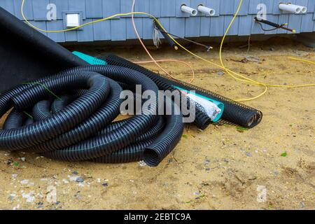 The drainage pipes system of laying underground utilities from black PVC sewer pipes of supply sewage Stock Photo