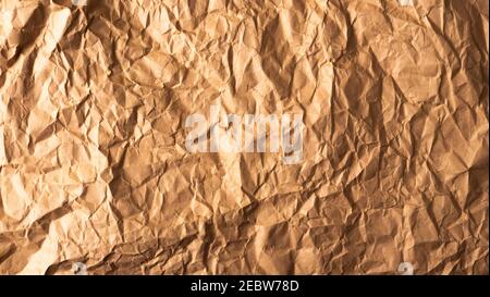 crumpled paper. a crumpled piece of paper. a crumpled piece of paper. fashionable paper texture. Stock Photo