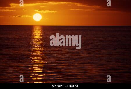 SUNSET OVER THE COASTLINE NEAR PORT NOARLUNGA IN SOUTH AUSTRALIA. Stock Photo