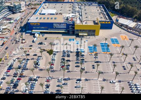 Ikea mega store and classic logo on a high poll, Aerial image. Stock Photo