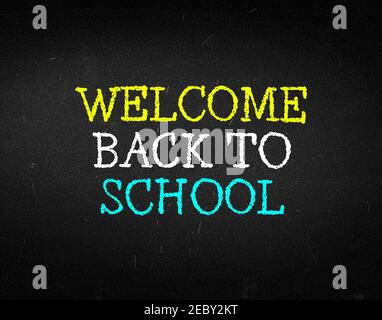 Welcome Back to School Abstract Background with text written on black board. Stock Photo