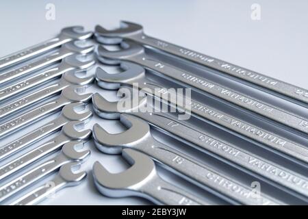Cut-out wrenches horizontally placed from the biggest to the smallest in a row. Hand tool. Tools for carpentry work. Type of fastener. Mend and repair Stock Photo