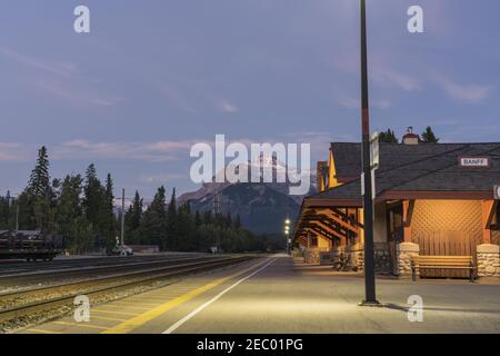 Banff Railway Station in summer evening. Banff National Park, Canadian Rockies. Banff, Alberta, Canada. Stock Photo