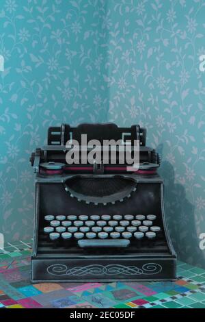 Retro typing machine on the table in corner Stock Photo