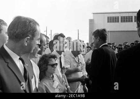 Inspection tour of NASA installations: Cape Canaveral Florida, 2:31PM. President John F. Kennedy (back to camera) greets site workers at Cape Canaveral Air Force Station, Cape Canaveral, Florida, following a tour of the facilities at Hangar S. President Kennedy visited Cape Canaveral as part of a two-day inspection tour of National Aeronautics and Space Administration (NASA) field installations. Stock Photo