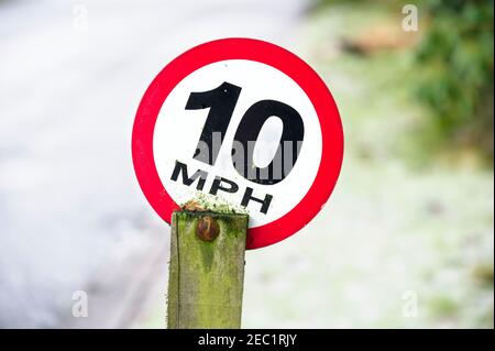 Ten mph construction building site speed safety sign England Stock Photo