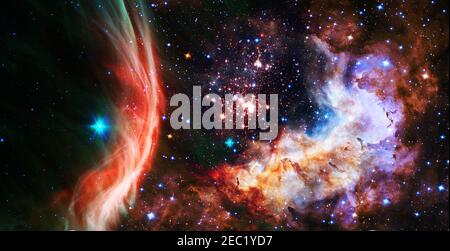 Giant glowing nebula. Space background with red nebula and stars. Elements of this image furnished by NASA. Stock Photo