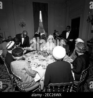 First Lady Jacqueline Kennedyu0027s (JBK) luncheon for Senatorsu0027 wives. Guests attend a luncheon for senatorsu2019 wives, given by First Lady Jacqueline Kennedy in the State Dining Room of the White House, Washington, D.C. Lorraine Cooper (wife of Senator John Sherman Cooper of Kentucky) sits at table in foreground. Also pictured (in background): Jane u0022Janeyu0022 Briggs Hart (wife of Senator Philip A. Hart of Michigan); Alice Saltonstall (wife of Senator Leverett Saltonstall of Massachusetts); Jane Hadley Barkley (wife of former Vice President and Senator from Kentucky, Alben W. B Stock Photo