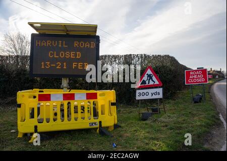 Harefield, Uxbridge, Middlesex, UK. 13th February, 2021. Locals were not impressed at the road closure this morning. The National Eviction Team Enforcement Agent Bailiffs evicted Stop HS2 activists from their camp in Harvil Road in the early hours this morning. Two protesters remain in trees at the site. HS2 have closed Harvil Road off from today until 21st February. Numerous HS2 Security personnel were blocking access to the road this morning. HS2 Ltd are building a viaduct across Harvil Road for the controversial High Speed Rail 2 link from London to Birmingham and have destroyed acres of tr Stock Photo