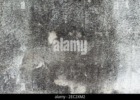 Rustic and old grey concrete wall photo texture. Shabby chic backdrop. Old concrete surface with drips and dirt. Obsolete texture in gray shades. Indu Stock Photo