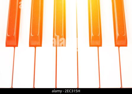 Piano keys in yellow light toned photo. Black and white keyboard of musical instrument. Fono lesson or orchestra concert banner template. Classical mu Stock Photo