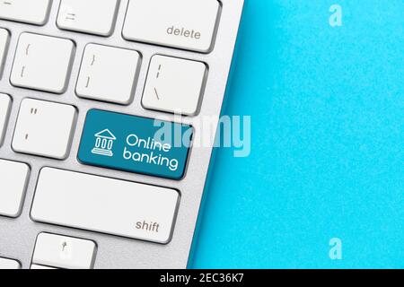 Online banking concept on keyboard with button. Stock Photo