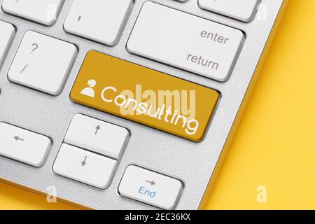 online consulting concept on keyboard with button. Stock Photo