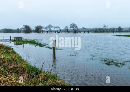 West Cork, Ireland. 13th Feb, 2021. Many parts of West Cork flooded today after a night of torrential rain. The River Ilen on the R594 near Caheragh burst its banks during the night. Credit: AG News/Alamy Live News Stock Photo