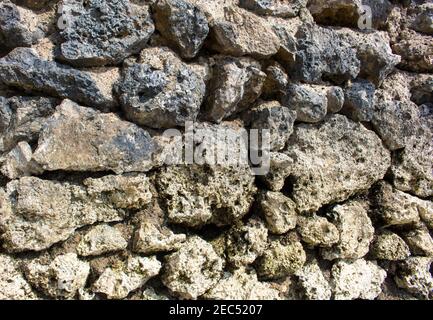 Natural stone background. Rustic old wall wallpaper. Rough grey stone bricks design. Ancient masonry wall big rocks. Rustic weathered stone texture. S Stock Photo