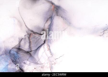 Beautiful abstract art background created with alcohol inks. Delicate pastel shades of pink, mauve and blue. Space for text. Stock Photo