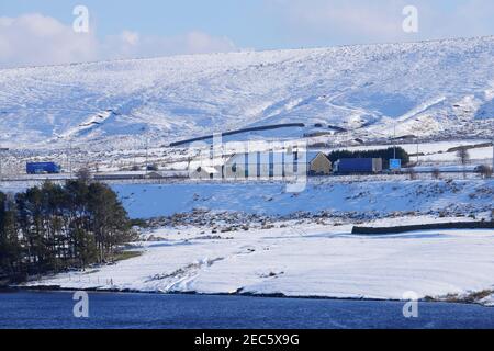 Stott Hall Farm sits between the Eastbound & Westbound carriageway of the M62 motorway on the border of Yorkshire & Lancashire. Stock Photo