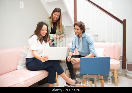 young people at work having a meeting informally Stock Photo