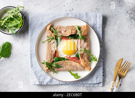 homemade buckwheat crepe galette with egg Stock Photo