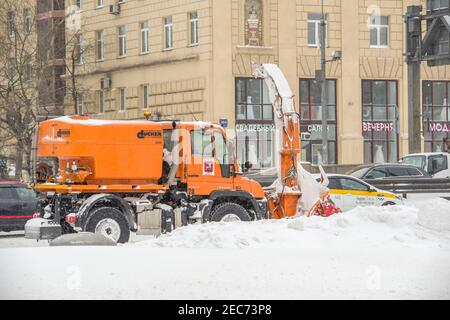 Moscow, Russia, February 13, 2021: Snowplow for loading snow into a truck. Stock Photo