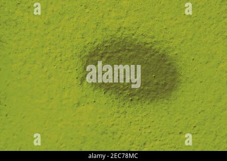 Old weathered grunge light green wall background Stock Photo