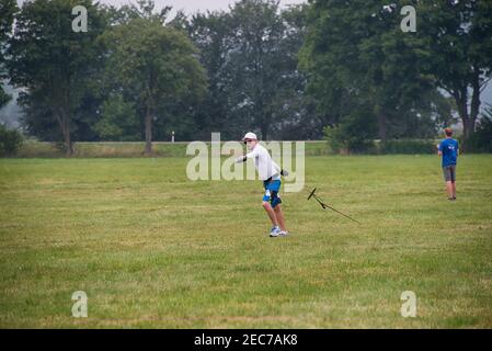 Lviv, Ukraine - July 23, 2017: Unknown aircraft modeler  launches his own radio-controlled  model  glider  in the countryside near the city of Lviv., Stock Photo