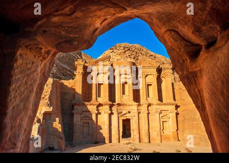 A view of The Monastery or Ad-Deir sculpted out of the rock, at Petra, Jordan.  The Monastery of Petra is the largest of the magnificent carved tombs Stock Photo
