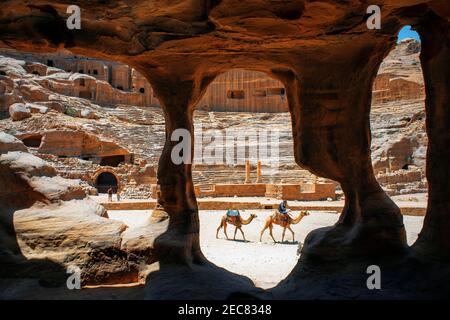 Roman Theater in the ruins of Petra, Jordan. Carved Amphitheater Theater Siq Petra Jordan. Theater built in Treasury built by the Nabataens in 100 AD, Stock Photo