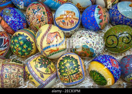 The eggs are covered with fine mosaics on biblical themes. Jordan souvenirs. Asia, Middle East, Jordan, Madaba, mosaic artwork Stock Photo