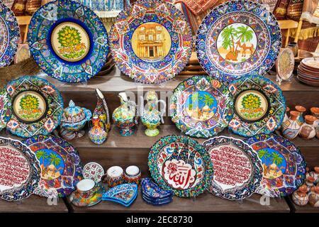 Ceramic plates souvenir in Amman, Jordan.  Bazaar with souvenirs near King Abdullah I mosque in Amman, Jordan Stock Photo