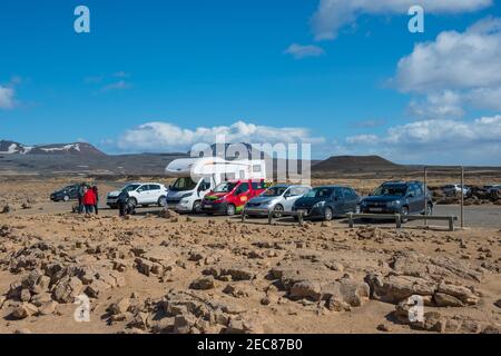 Myvatn Iceland - May 23. 2018: Cars parked at the geothermal area Hverir Stock Photo