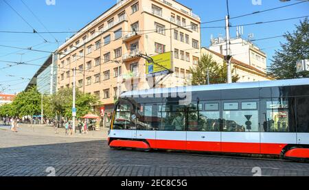 Prague, Czech Republic - July 2018: Electric tram driving on a street near the centre of Prague. The city has an extensive network of trams. Stock Photo