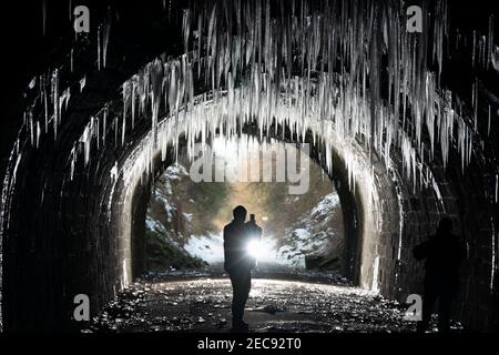 Derbyshire, UK, 13th Feb 2021. Hundreds of giant icicles hang in Hopton tunnel in Derbyshire after a prolonged period of cold weather, Peak Destrict, UK. Credit: Jon Super/Alamy Live News. Stock Photo