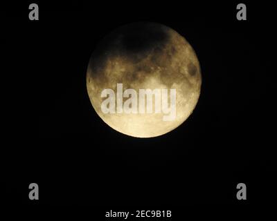 Full moon isolated against black sky. close up shot of full moon Stock Photo