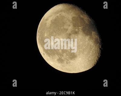 Full moon isolated against black sky. close up shot of full moon Stock Photo