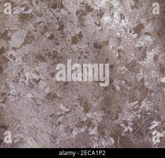 Full frame bronze textured patterned mottled background with space for copy Stock Photo