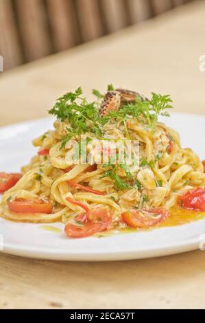 Homemade fresh pasta with crab sauce Stock Photo