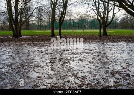 Eton, Windsor, Berkshire, UK. 13th February, 2021. Following freezing temperatures and flooding over the past the few days, parts of the playing fields at Eton College have iced over. Temperatures are set to rise again next week bringing a welcome end to the cold snap. Credit: Maureen McLean/Alamy Live News Stock Photo