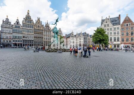 Brabo fountain and historic 16th-century Guildhalls at the Grote Markt square in Antwerp, Flanders, Belgium Stock Photo