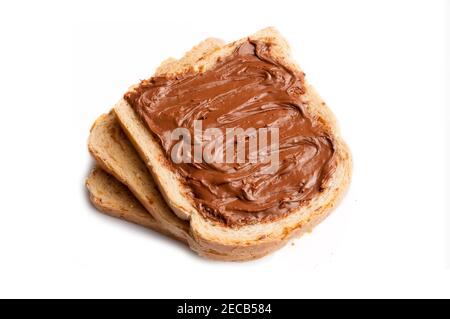 Slices of cereal bread with chocolate hazelnut cream spread isolated on white background Stock Photo