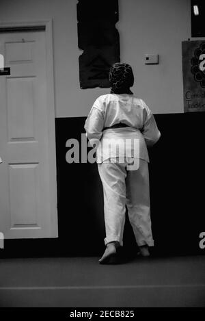 This action photo is of my son and his classmates in a Karate class. Karate is a physically and mentally challenging sport that builds agility. Stock Photo