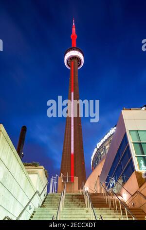 Toronto CN Tower at night illuminated in Canada's flag colors Stock Photo