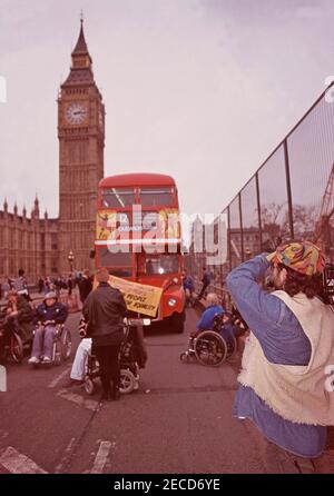 Wheelchair users from DAN (Disabled Action Network) handcuff themselves to a London bus on Westminster Bridge, London in  February 1995 as part of a series of protests about lack of disabled persons access to public transport, in the lead up to the Disability Discrimination Act being debated in Parliament. Stock Photo