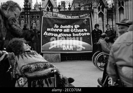 Wheelchair users from DAN (Disabled Action Network) protest outside Parliament as part of a series of protests about lack of disabled persons access to public transport, in the lead up to the Disability Discrimination Act being debated in Parliament, February 1995 Stock Photo