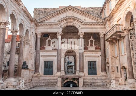 Split, Croatia - Aug 15, 2020: Empty square at Diocletian Palace in early morning sunrise Stock Photo