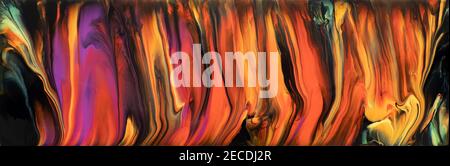 Abstract image of various colors of acrylic paint mixed together using a paint pouring  technique Stock Photo